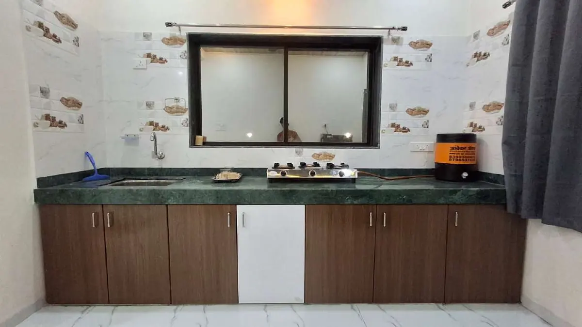 Fully equipped kitchen in Shuubh Aavishkar 2BHK Villa, a 2 BHK villa in Lonavala on rent
