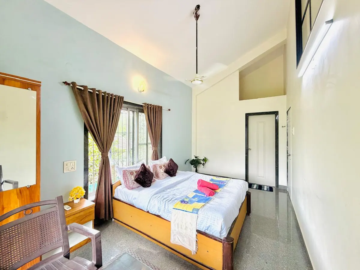 Air-conditioned bedroom in Elite Villa, a 4 BHK villa in Lonavala on rent
