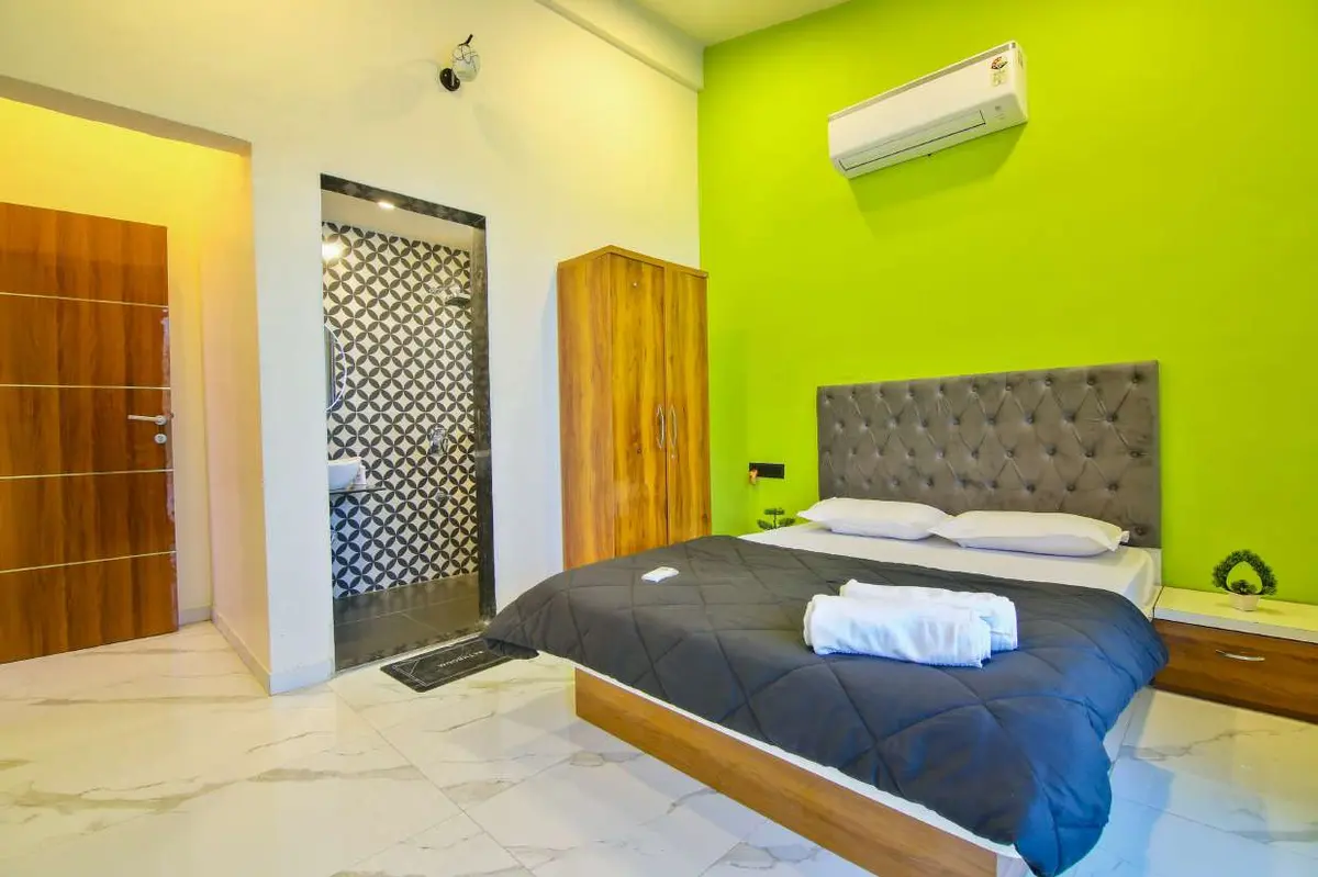 Air-conditioned bedroom in Shuubh Hillside 4BHK Villa, a 4 BHK villa in Lonavala on rent