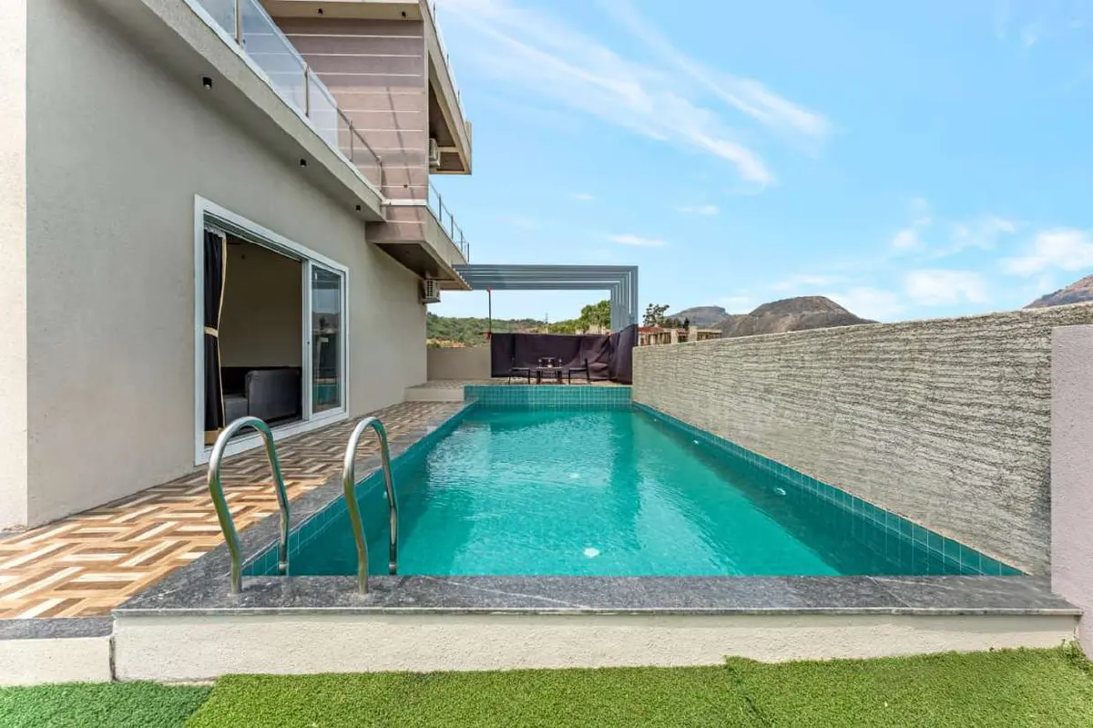 Private swimming pool at Shuubh Kaustubh 5BHK Villa, a 5 BHK villa in Lonavala on rent