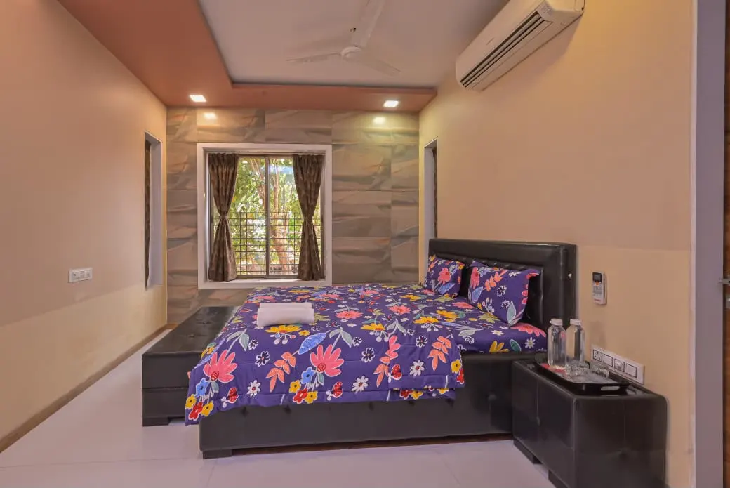 Air-conditioned bedroom in Shuubh Mountain Amber 5BHK Villa, a 5 BHK villa in Lonavala on rent