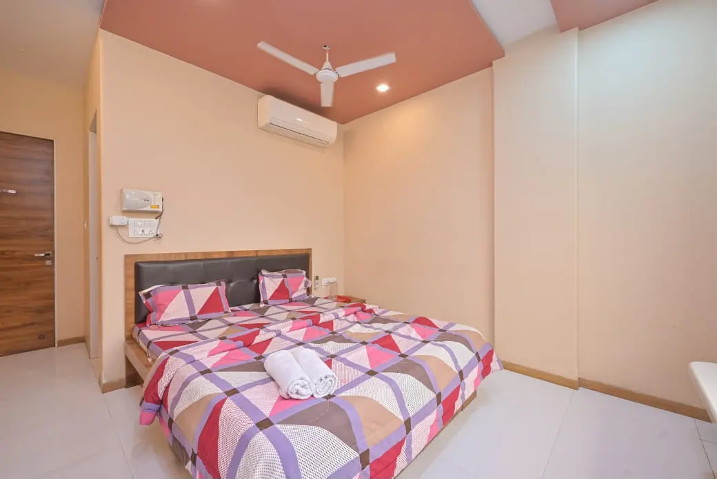 Air-conditioned bedroom in Shuubh Mountain Amber 5BHK Villa, a 5 BHK villa in Lonavala on rent