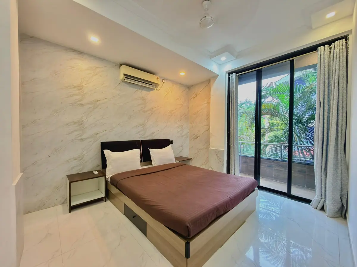 Air-conditioned bedroom in Shuubh Star 4BHK Villa, a 4 BHK villa in Lonavala on rent