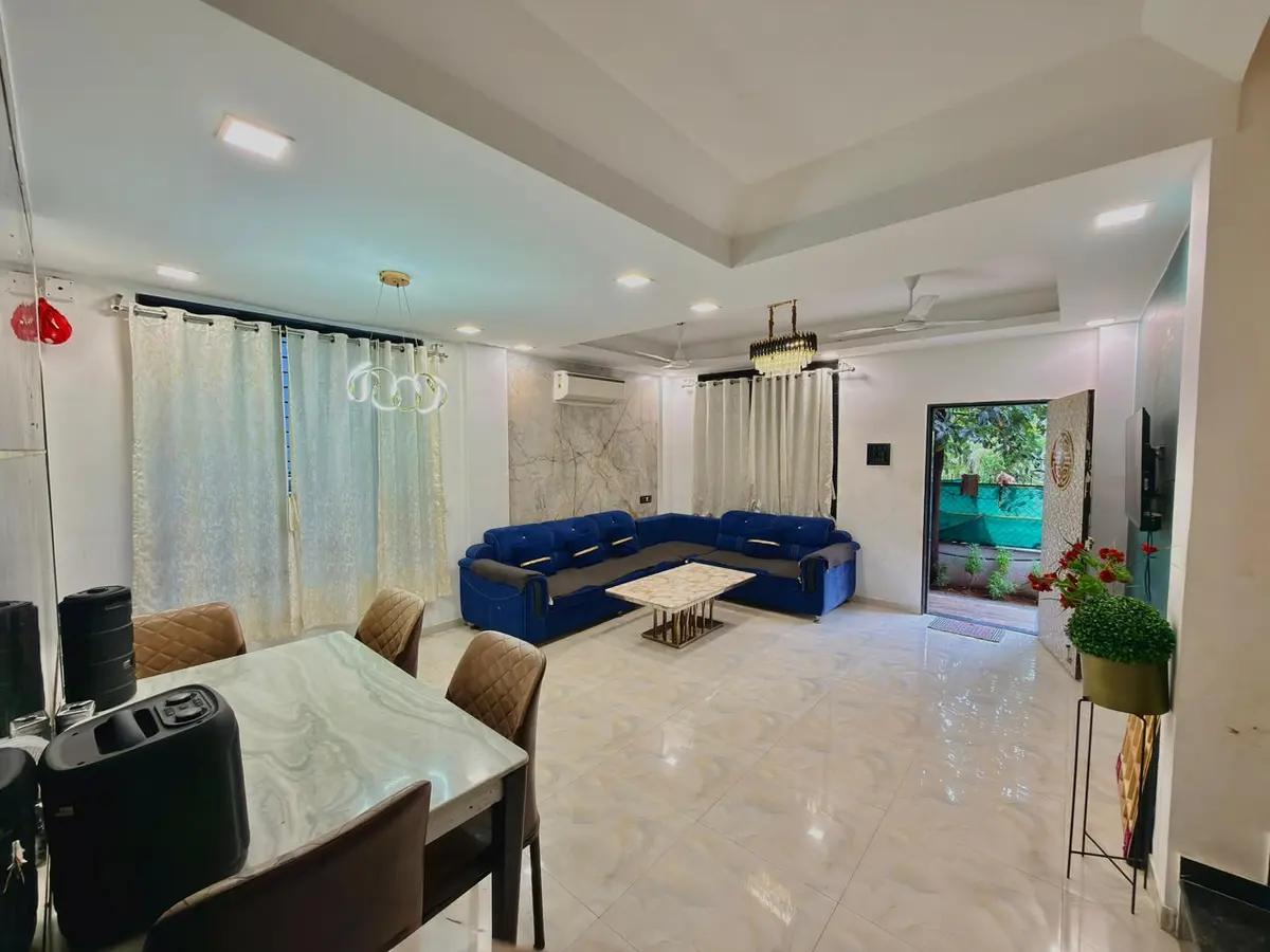 Living room at Shuubh Star 4BHK Villa prepared for arriving guests